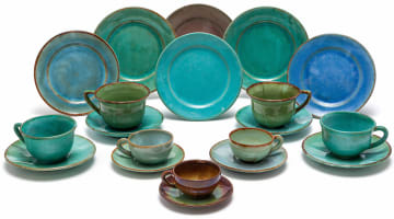 Three Linn Ware demi-tasse cups and saucers