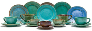 Three Linn Ware demi-tasse cups and saucers