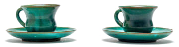 Two Linn Ware green-glazed coffee cups and saucers
