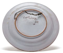A Linn Ware polychrome glazed pictorial charger, 1952
