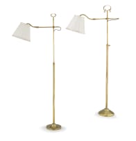 Two brass adjustable standing lamps