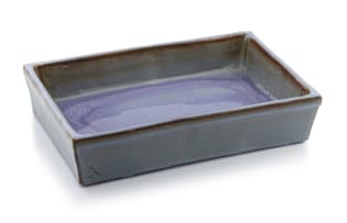 A Linn Ware mottled purple, grey-and-russet-glazed trough