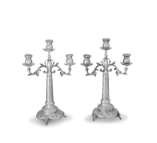 A pair of Egyptian silver three-light candlebra, post 1946