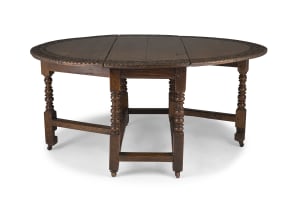 A carved oak gateleg table, possibly French, 19th century