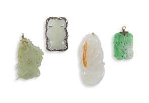 A Chinese white jade brooch, Qing Dynasty, 19th/20th century
