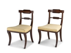 A pair of Regency style mahogany and upholstered side chairs, 19th century