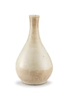 A Chinese cream-glazed craquelure bottle vase, Ming Dynasty, 15th century