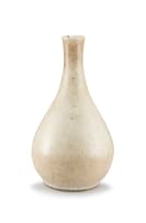 A Chinese cream-glazed craquelure bottle vase, Ming Dynasty, 15th century