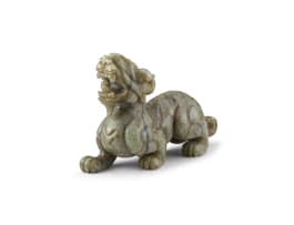 A Chinese mottled-green jade carving of a kylin, late Qing Dynasty or later