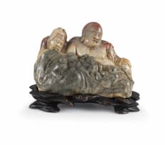 A Chinese figural soapstone group, Qing Dynasty, 19th century