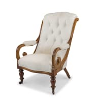 A walnut and upholstered armchair