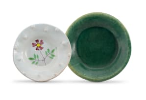 Hylton Nel; Two Dishes, one hand painted with a flower and with flowerhead prunts, the other with a green glaze, two