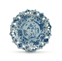An Italian blue and white tin-glazed plate, Ulisse Cantagalli (Italian, 1839-1901), late 19th century