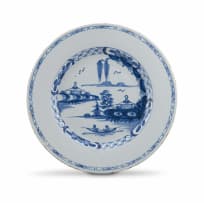 A pair of English blue and white faience plates, late 18th century
