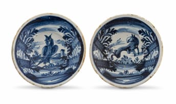 A pair of Spanish blue and white faience dishes, late 18th/early 19th century