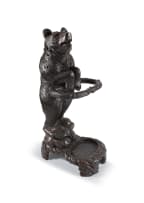 A Black Forest Bear stained and carved linden wood stick/umbrella stand, late 19th/early 20th century