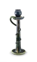 A Belgian earthenware, green, blue and brown lustre glazed candlestick, late 19th/early 20th century