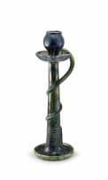 A Belgian earthenware, green, blue and brown lustre glazed candlestick, late 19th/early 20th century