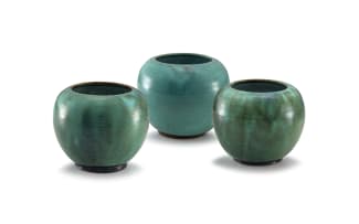 A pair of Linn Ware mottled sea green-glazed vases
