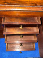 A mahogany secretaire linen press, 19th century