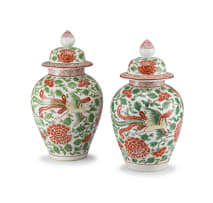 A pair of Chinese famille-verte vases and covers, Qing Dynasty, 18th/19th century