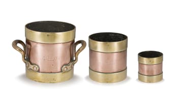 Three George V brass and copper measures, 1932