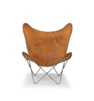 A tan leather and chromed Butterfly chair after a design by Antonio Bonet, Juan Kurchan and Jorge Hardoy