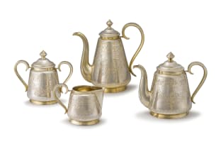 A Russian four-piece silver-gilt tea and coffee service, Ivan Yefimovich Konstantinov, Moscow, 1875-1882