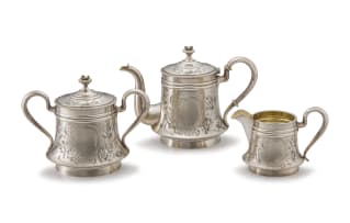 A Russian three-piece silver-gilt and mother-of-pearl tea service, Ivan Andreyevich Ado, Kazan, 1899-1916