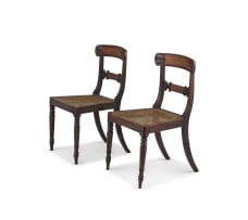 A pair of Regency simulated rosewood and inlaid side chairs