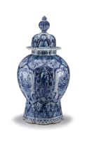 A pair of Dutch Delft vases and covers, 18th/19th century