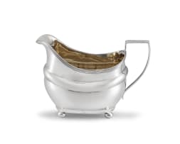 A George III silver milk jug, possibly Duncan Urquhart & Naphtali Hart, London, 1810