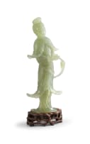 A Chinese celadon jade figure of Guanyin, 20th century