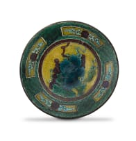 A Japanese ko-kutani iridescent yellow, brown and green enamelled dish, Edo period, 18th century