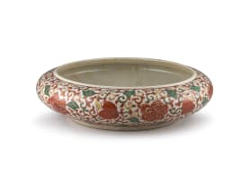 A Chinese iron-red, yellow and green-glazed crackleware bowl, Qing Dynasty, 19th century