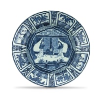 A 'Kraak' style blue and white dish, 18th and later decorated