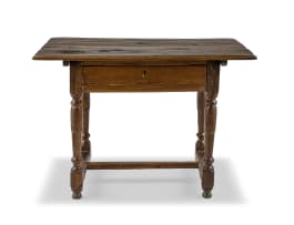 A Cape yellowwood and stinkwood peg-top table, 18th century