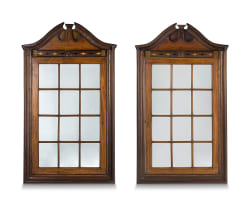A pair of Cape stinkwood and yellowwood inlaid wall cupboards, 19th century