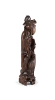 A Chinese carved hardwood figure of He Xiangu, early 20th century