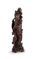 A Chinese carved hardwood figure of He Xiangu, early 20th century