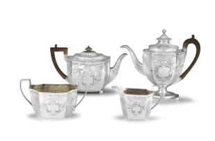 An assembled George III four-piece silver tea service, Thomas & Joseph Guest, London, 1806 and Thomas Robins, London, 1805