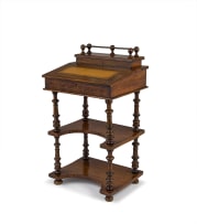 A Victorian walnut and inlaid davenport desk
