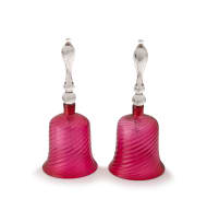 A pair of cranberry and clear-glass bells, 19th/20th century