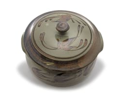 A stoneware casserole dish and cover, Tim Morris, 1941-1990