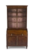 A Regency mahogany and inlaid bureau bookcase