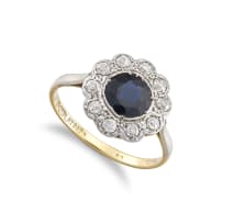 Diamond and blue sapphire platinum and 18ct yellow gold ring