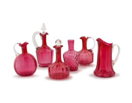 A Victorian cranberry and clear-glass jug