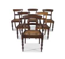 Five Cape stinkwood chairs and an armchair, mid 19th century