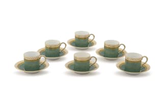 A set of twelve Royal Worcester coffee cans and saucers, 1934