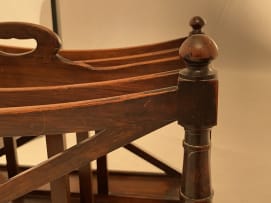 A George III style mahogany and rosewood canterbury, 19th century